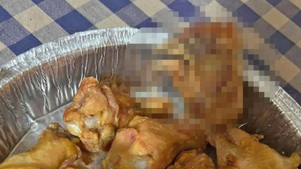 Eve tavuk kanadı siparişi eden kadın, kutunun içine yanlışlıkla konulan kafatasını ısırdı